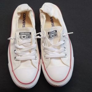 Ladies tie and slip on white Converse sneakers